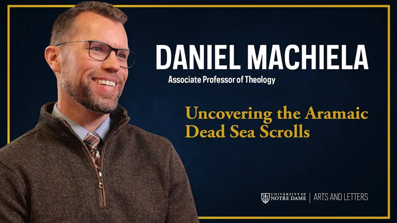 Daniel Machiela, Associate Professor of Theology, smiles wearing glasses and a brown sweater. Text on the dark blue background reads, Uncovering the Aramaic Dead Sea Scrolls, with the University of Notre Dame Arts and Letters logo.